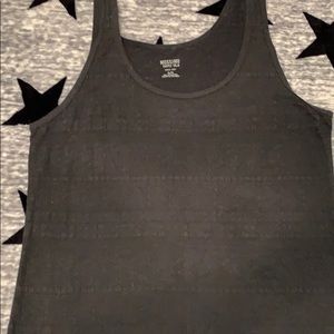 Very pretty tribal cut tank top